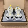 Balenciaga 5XL Cargo Black Yellow Chunky Sneakers