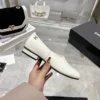 Chanel Black Rubber Loafers