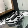 Chanel Black White Lambskin Sneakers
