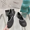 Chanel Black Canvas Sneakers