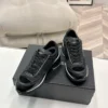 Chanel Black White Calfskin Sneakers